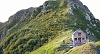 Alpe La Colma , alle spalle parte il sentiero per il Proman